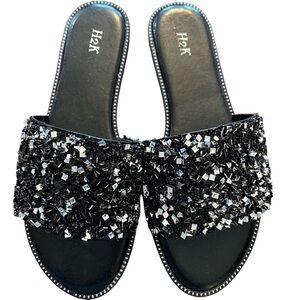 New black flat sandals